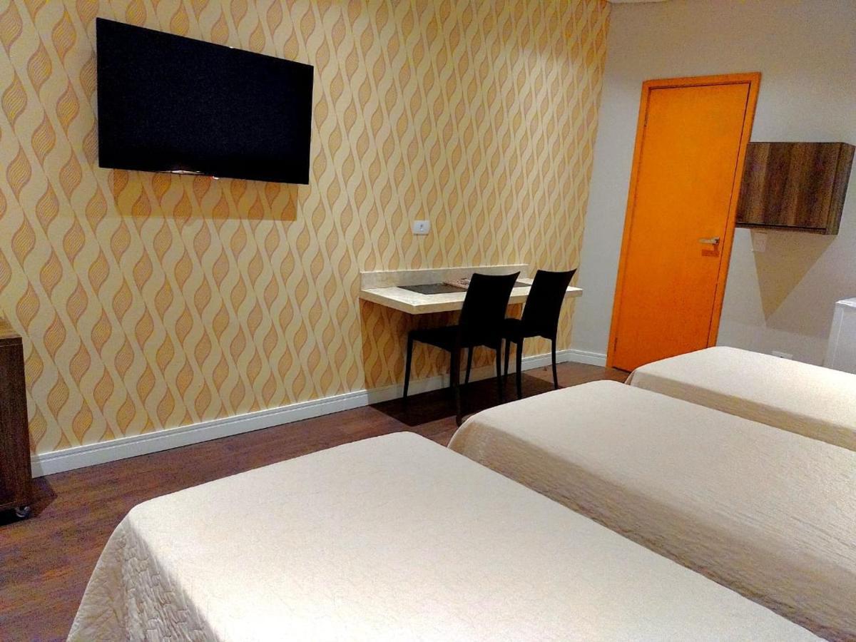 Guess Hotel & Motel Гуарульюс Экстерьер фото