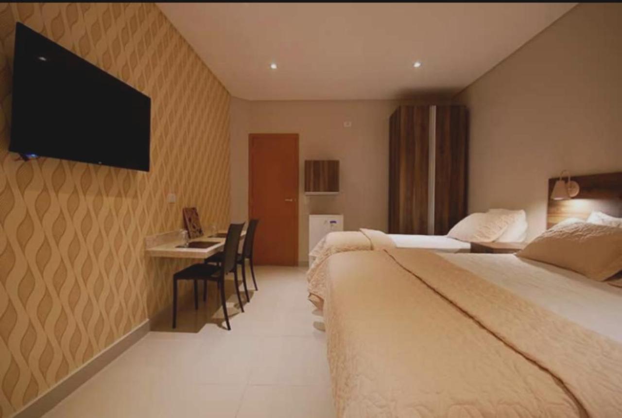 Guess Hotel & Motel Гуарульюс Экстерьер фото