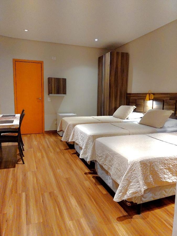 Guess Hotel & Motel Гуарульюс Экстерьер фото