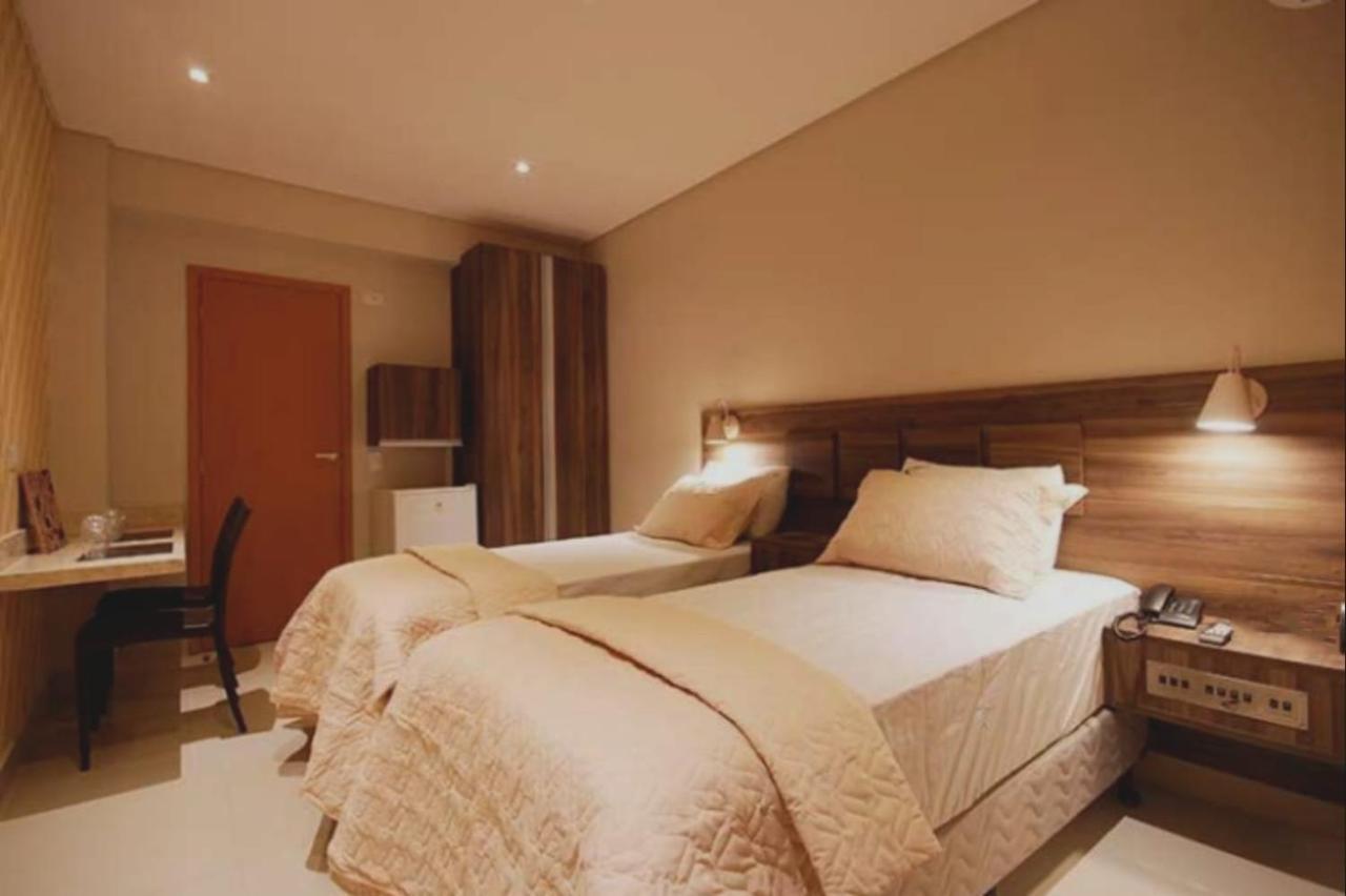 Guess Hotel & Motel Гуарульюс Экстерьер фото