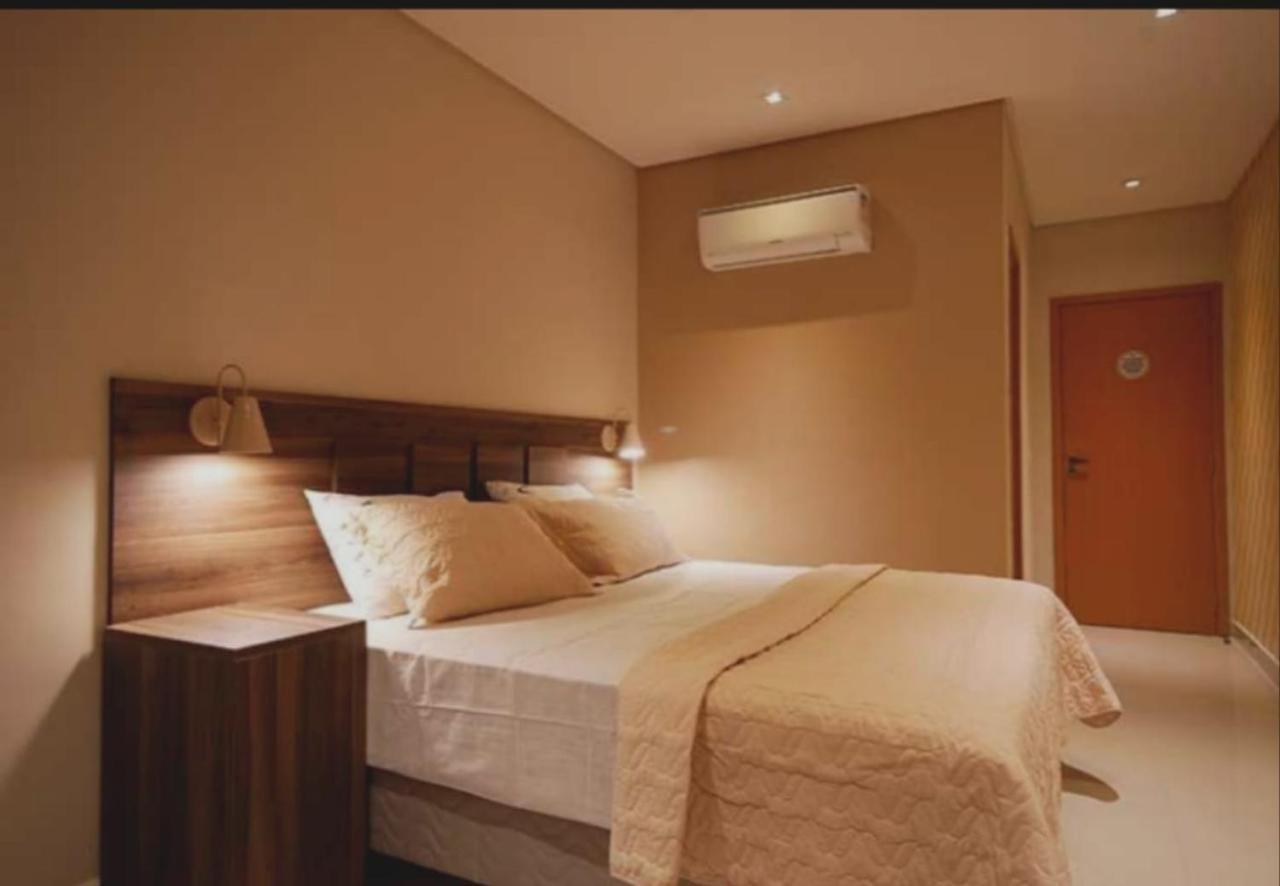 Guess Hotel & Motel Гуарульюс Экстерьер фото